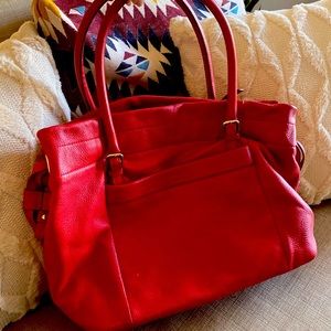 Kate Spade bag lightly used, striped detailing inside.